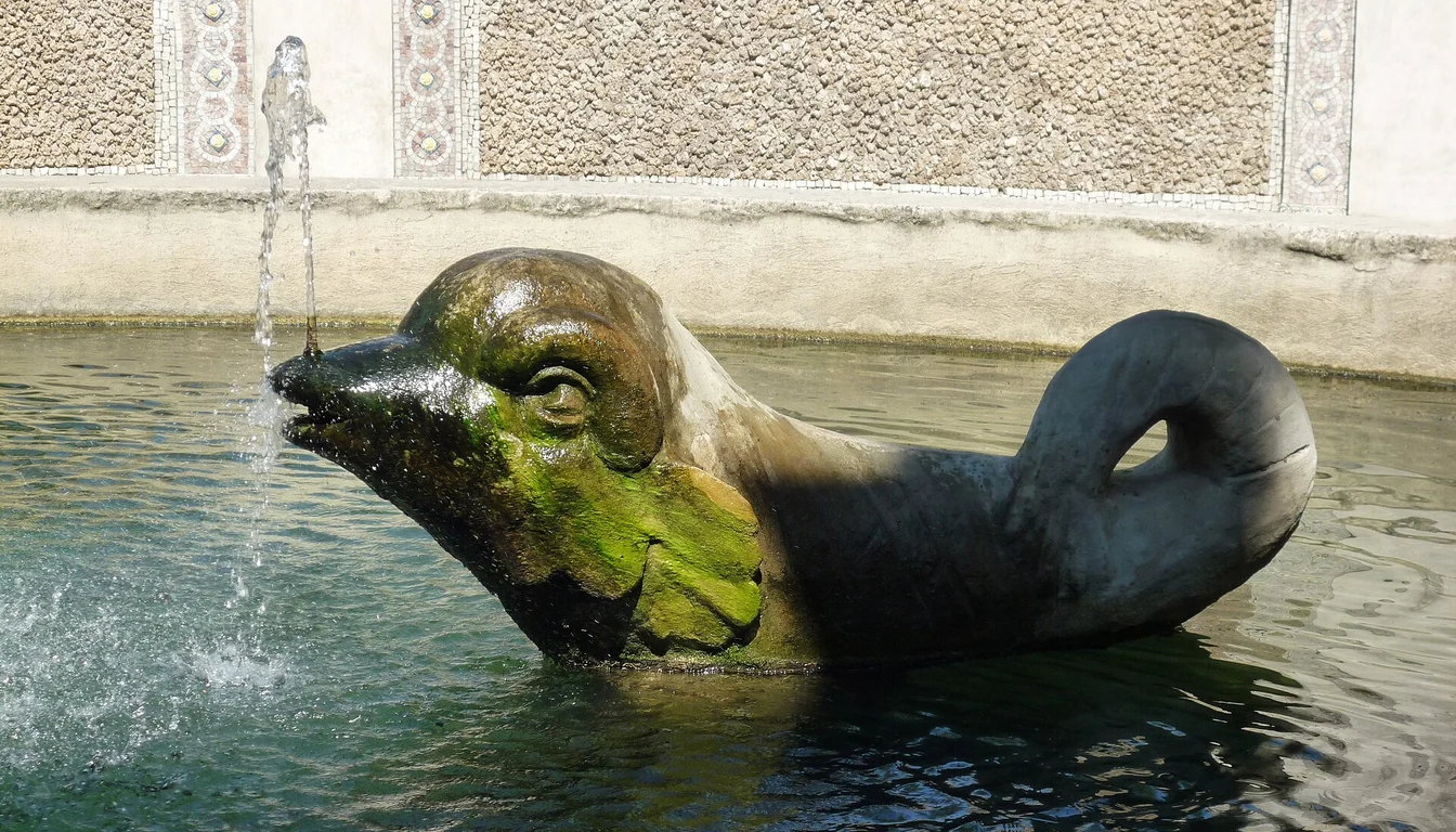 A sculpted fountain spout in a pool at Villa d'Este