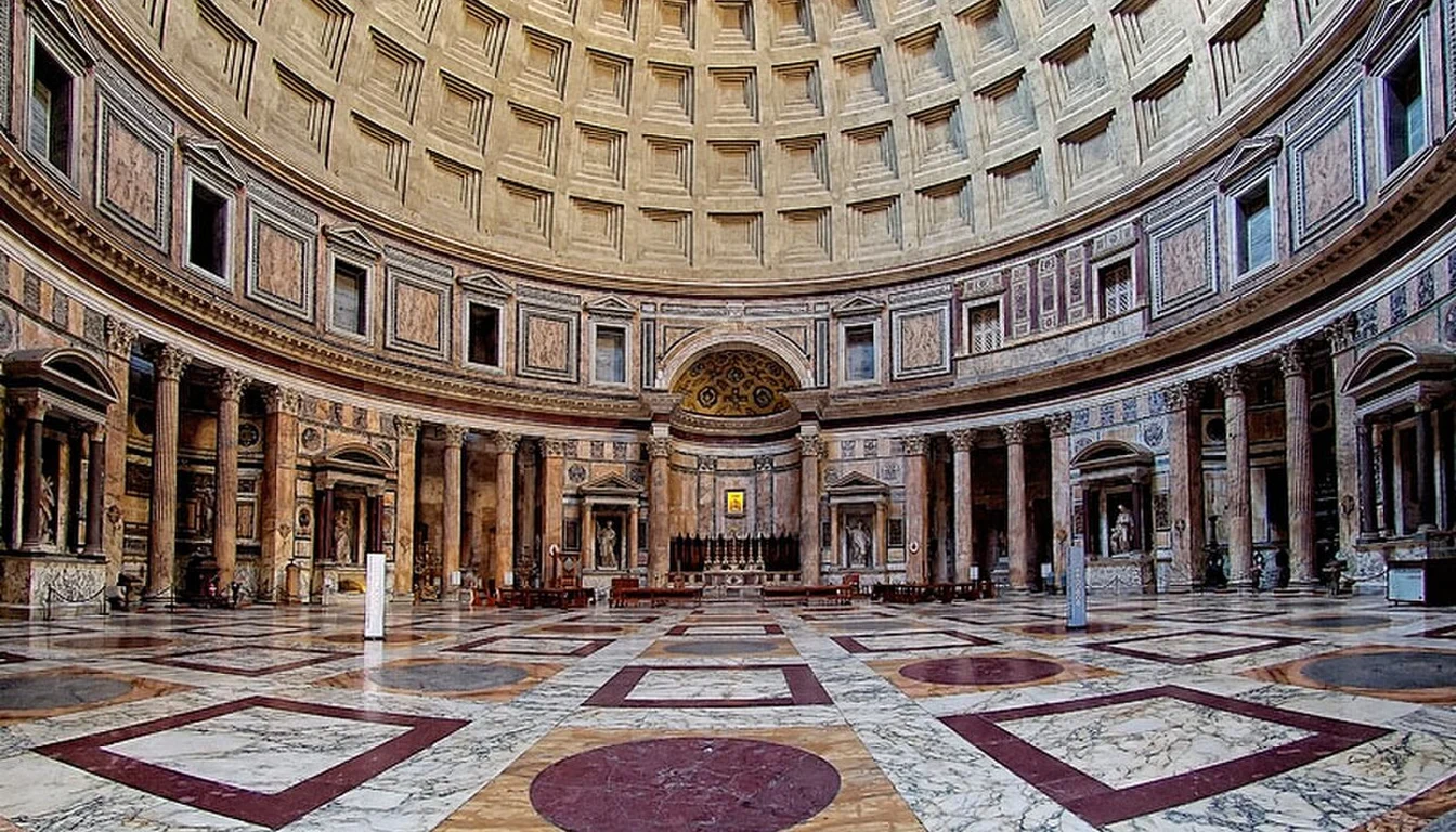Interior of the Pantheon with its coffered dome, columns and patterned floor